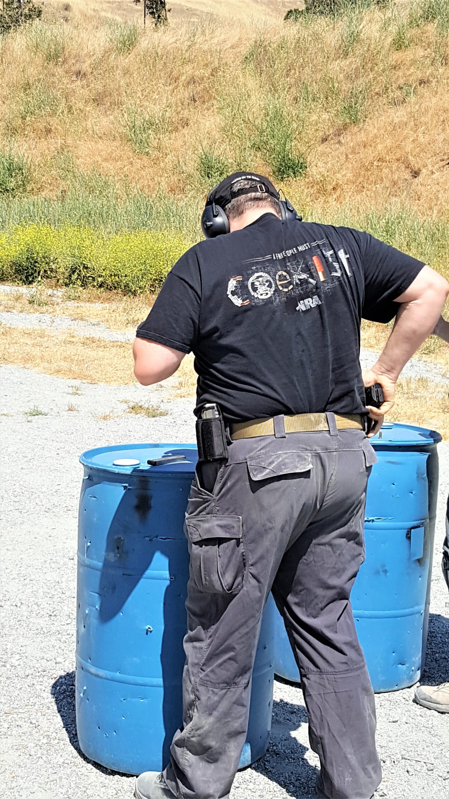 holstering pistol