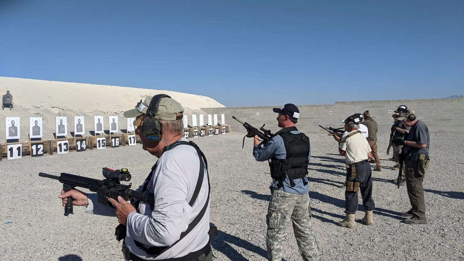 Rifle students practicing safe handling during organized group range training