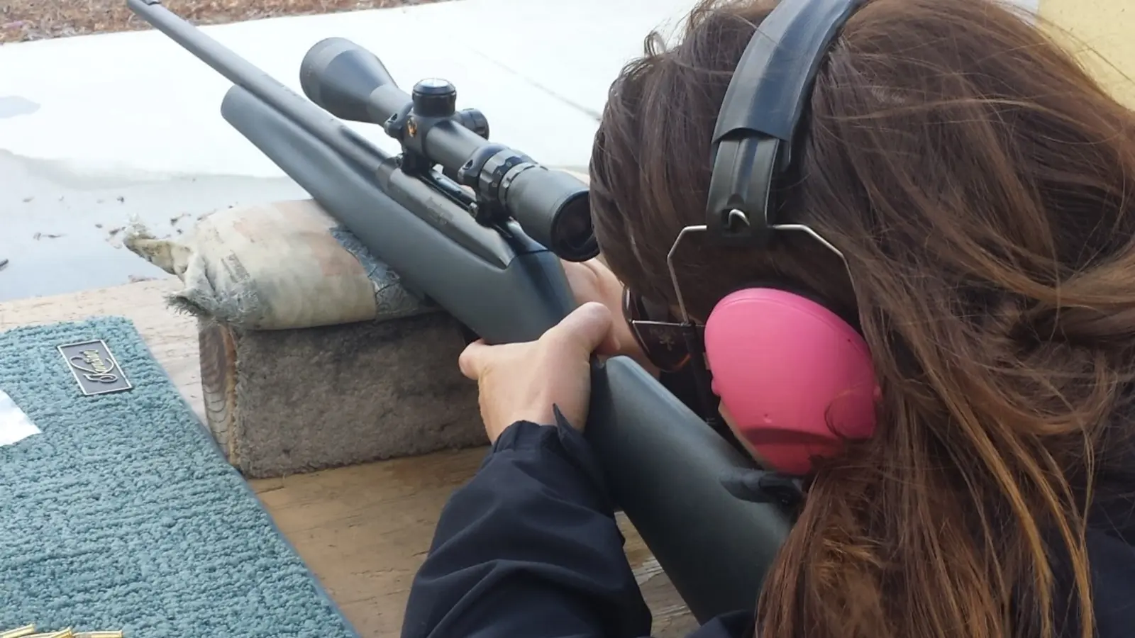 Student training with a scoped Remington semi automatic .22 LR rifle